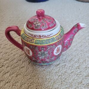 Elegant Pink Chinese Teapot with Intricate Design